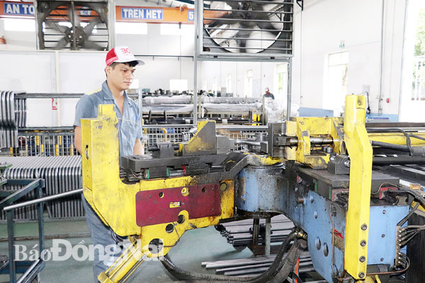 Sản xuất các linh kiện máy móc xuất khẩu tại Công ty TNHH Công nghiệp Boss (Khu công nghiệp Sông Mây, H.Trảng Bom). Ảnh: H.GIANG
