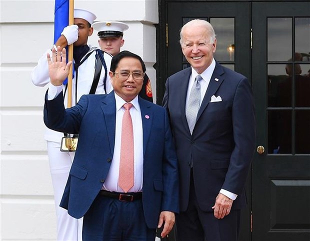 Vietnamese Prime Minister Pham Minh Chinh (L) meets with US President Joe Biden.