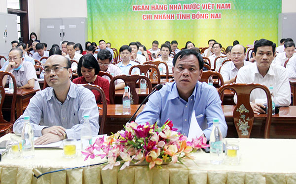 Lãnh đạo UBND tỉnh và Ngân hàng Nhà nước Việt Nam chi nhánh Đồng Nai tham dự hội nghị tại điểm cầu Đồng Nai. Ảnh: Hải Quân
