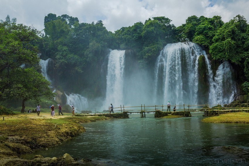 Laying at the foot of the waterfall is a river. 