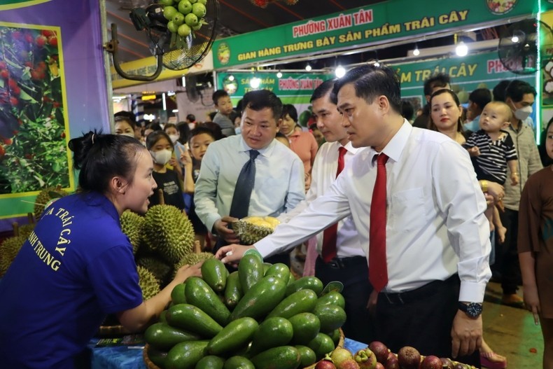 Delegates visit booths at the festival