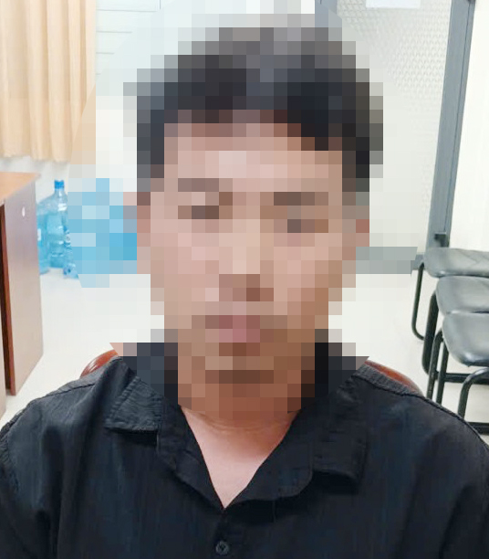 Huỳnh Kim Thành tại cơ quan điều tra. Ảnh: CTV