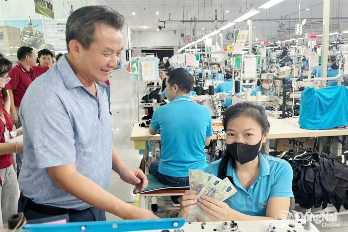 Tet bonuses provide added motivation for workers
