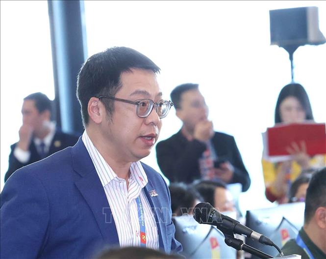 Phóng viên Dương Tùng của Thông tấn xã Việt Nam đặt câu hỏi. Ảnh: Phương Hoa/TTXVN