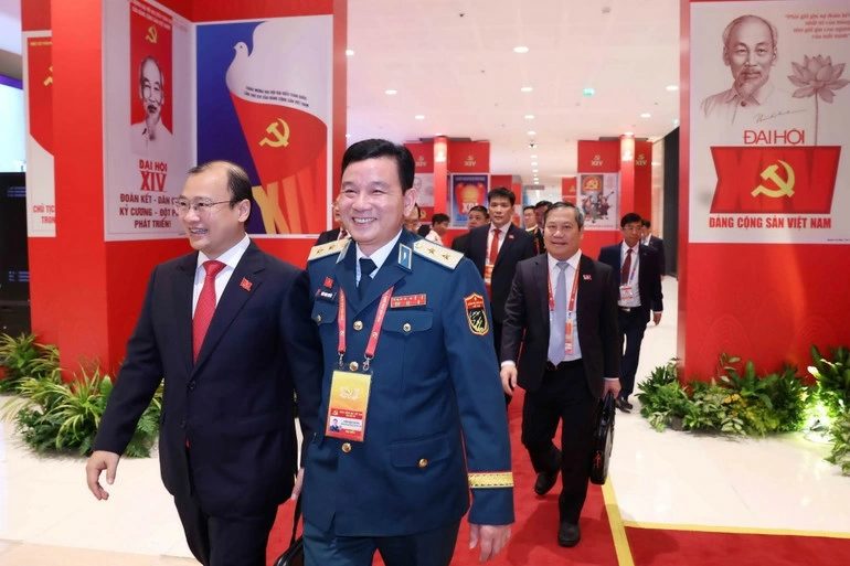 Các đại biểu đến dự Đại hội XIV của Đảng. Ảnh: TTXVN