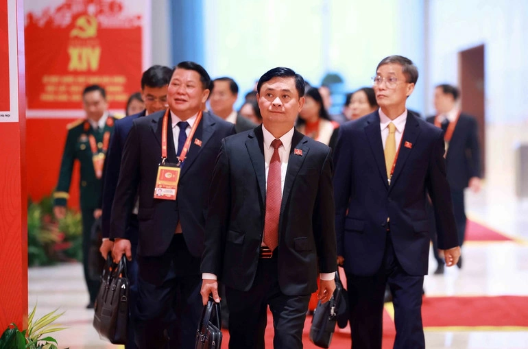 Các đại biểu đến dự Đại hội XIV của Đảng. Ảnh: TTXVN