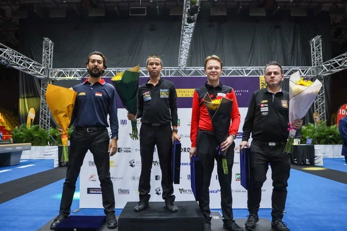 Trần Quyết Chiến (thứ 2 trái sang) là nhà vô địch Bogota năm ngoái. Ảnh: SGGP