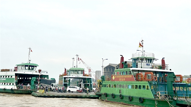 People use Cát Lái ferry to travel between HCM Citys Thủ Đức city and Đồng Nai Provinces Nhơn Trạch District. — VNS Photo Nguyễn Diệp
