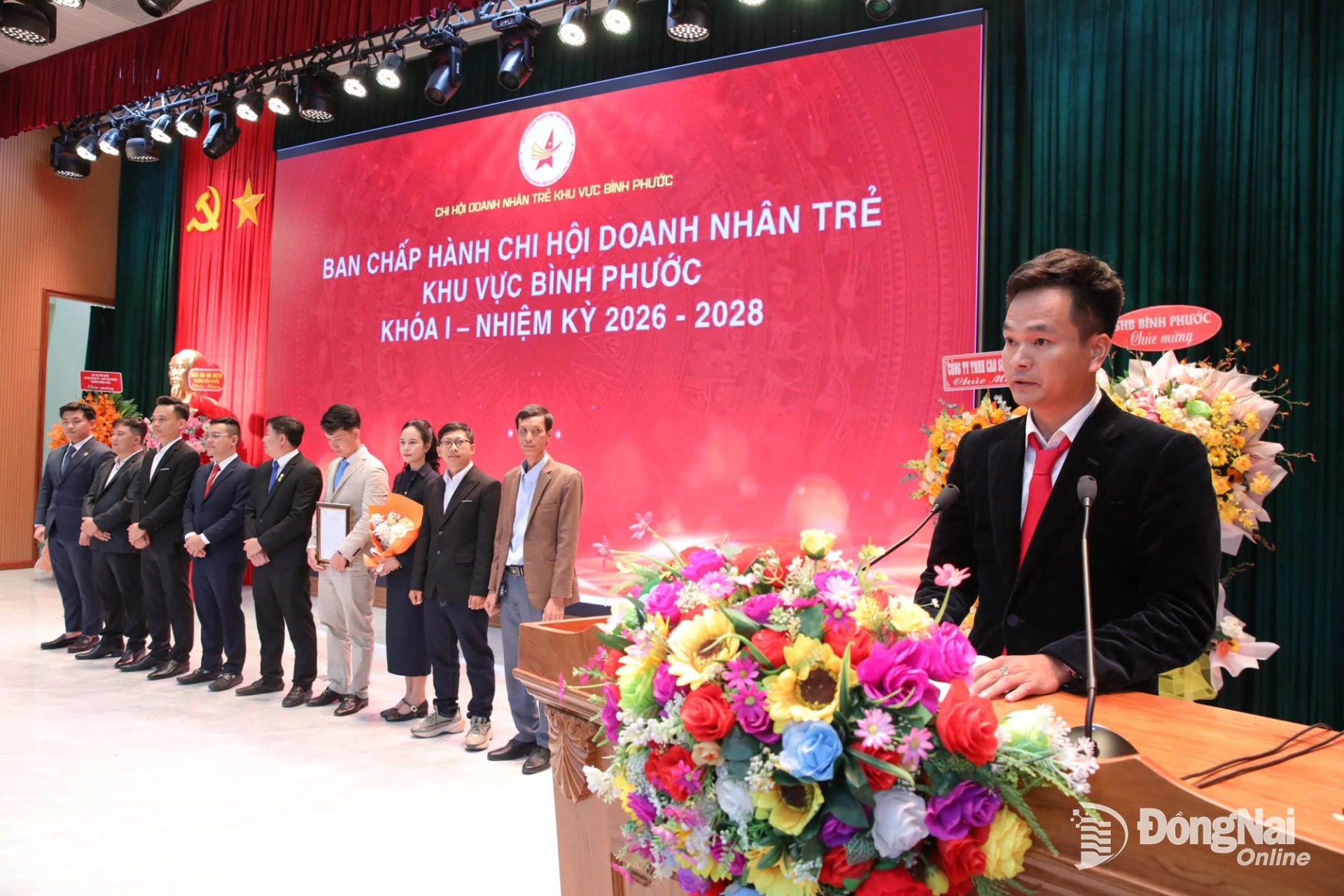 Vo Quang Hieu, Deputy General Director of Thuan Loi Rubber Co., Ltd., and Chairman of the Binh Phuoc area’s Young Entrepreneurs Sub-Association for the 2026–2028 term, delivers his inaugural remarks. Photo: Truong Hien
