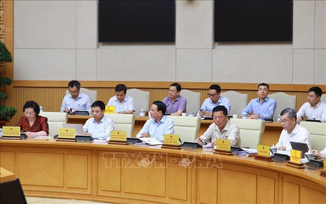 Phó Thủ tướng và các thành viên Chính phủ tham dự họp Thường trực Chính phủ. Ảnh: Dương Giang/TTXVN
