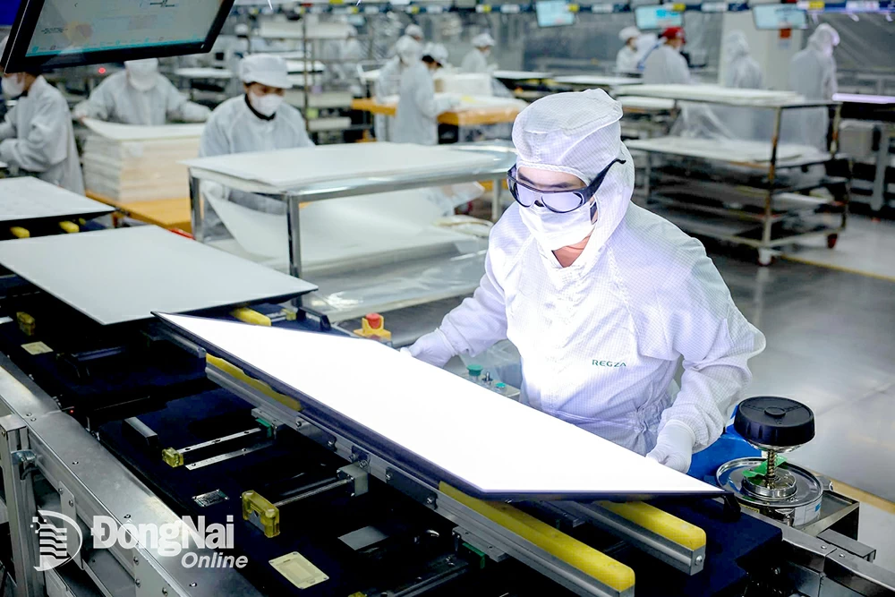 Kiểm tra chất lượng sản phẩm tivi tại Công ty TNHH Điện tử Regza Việt Nam (Khu công nghiệp Long Thành.
Ảnh: Hoàng Hiếu