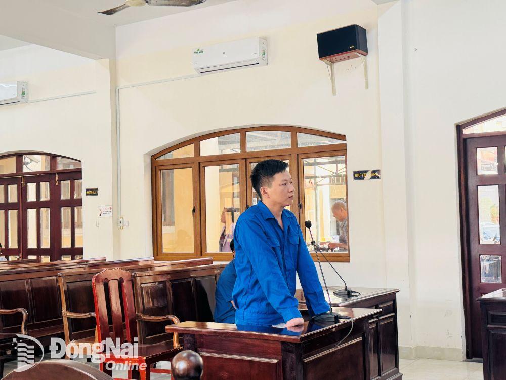 Bị cáo Nguyễn Văn Quang tại phiên tòa xét xử. Ảnh: Tố Tâm