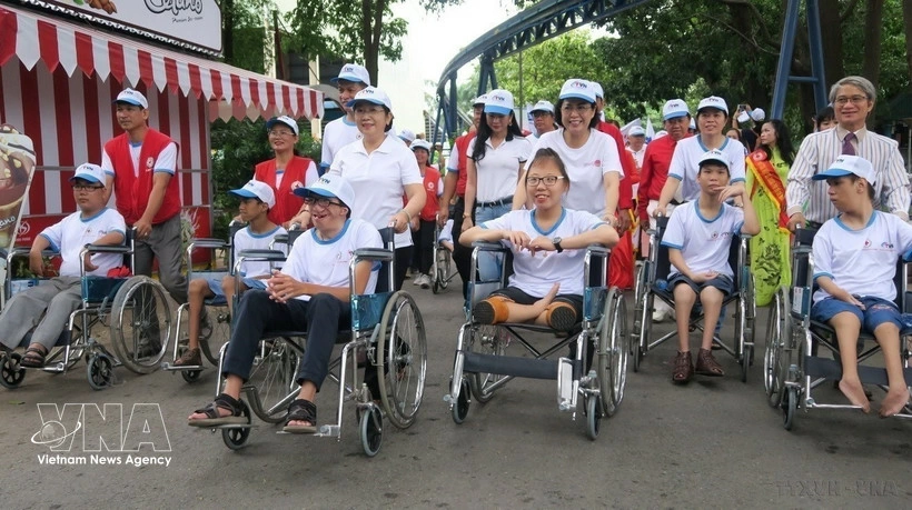 Many persons with disabilities have become inspiring examples of resilience, successfully integrating into the community and earning recognition and respect across all aspects of social life. (Photo: VNA)