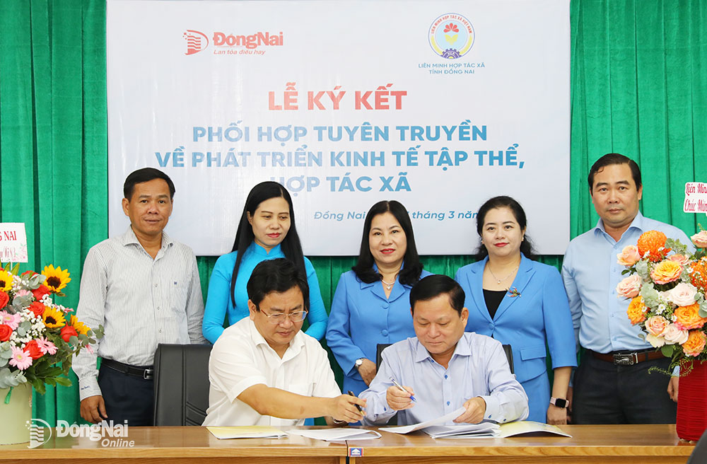 Ký kết hợp tác tuyên truyền phát triển kinh tế tập thể giữa Báo Đồng Nai và Liên minh Hợp tác xã Đồng Nai, tháng 3-2024. Ảnh: Huy Anh