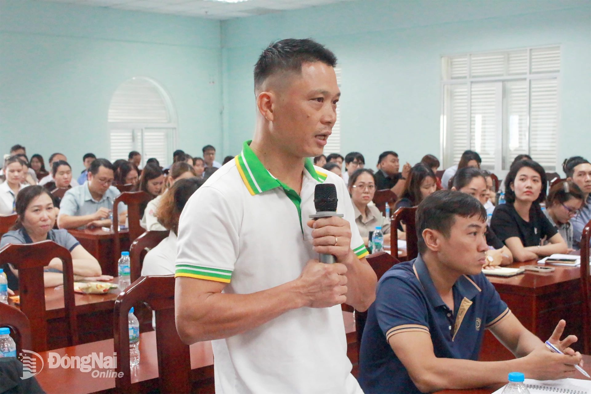 Đại diện doanh nghiệp phát biểu ý kiến tại hội nghị. Ảnh: N.Hòa