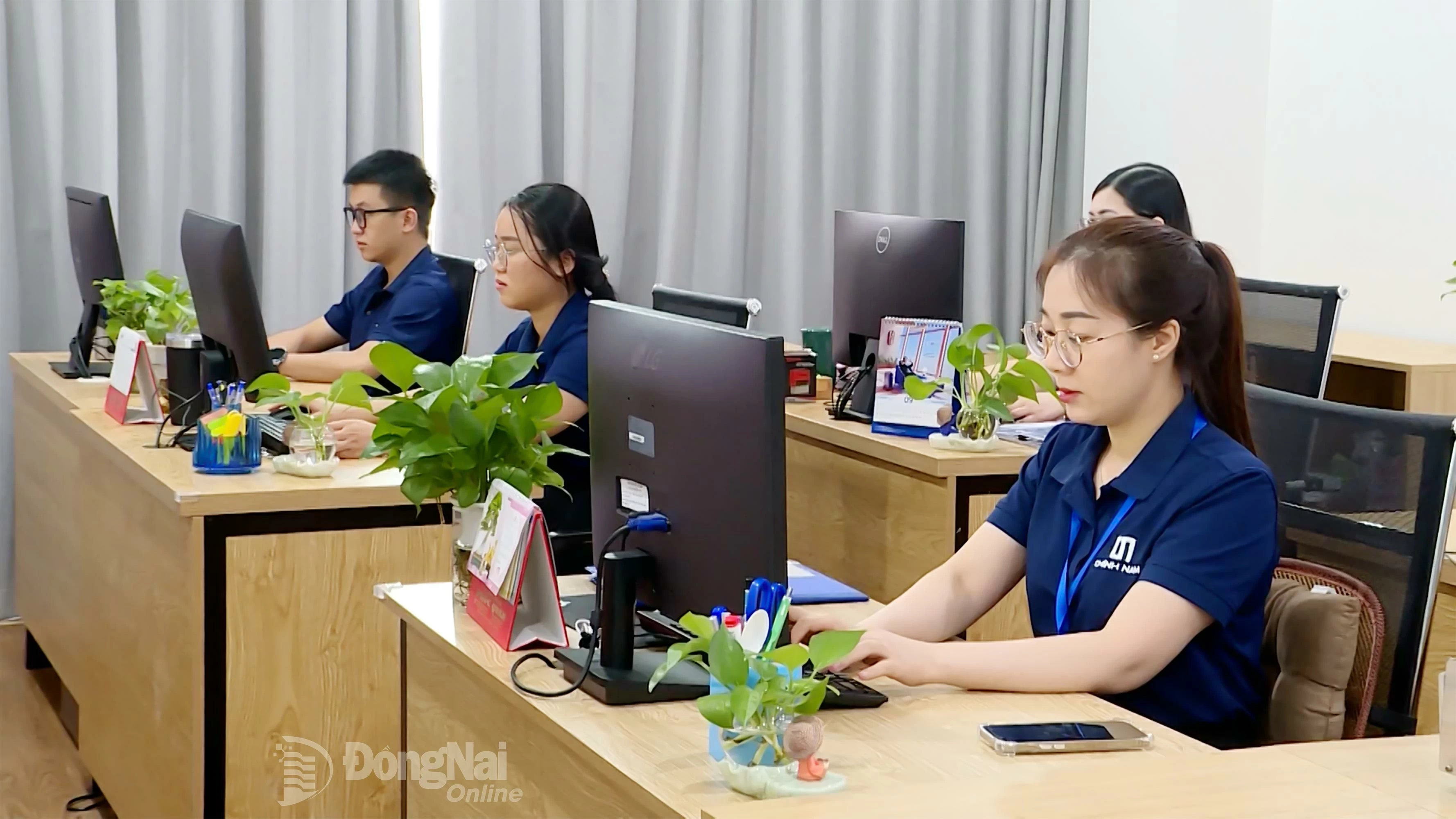 An employee of Chinh Nam Construction Design JSC at work.

