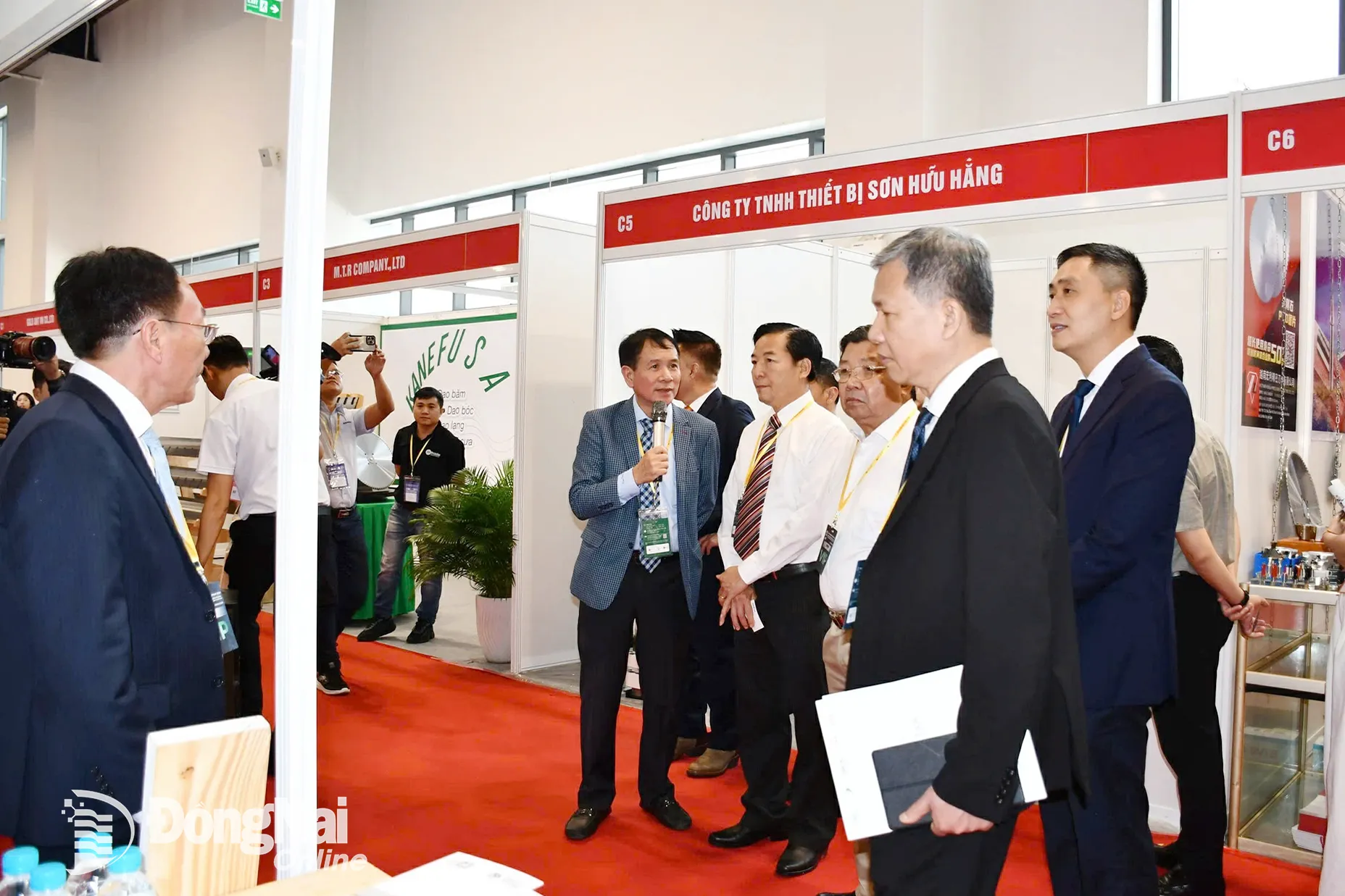 Delegates visit booths at the fair. Photo: Lam Ngan