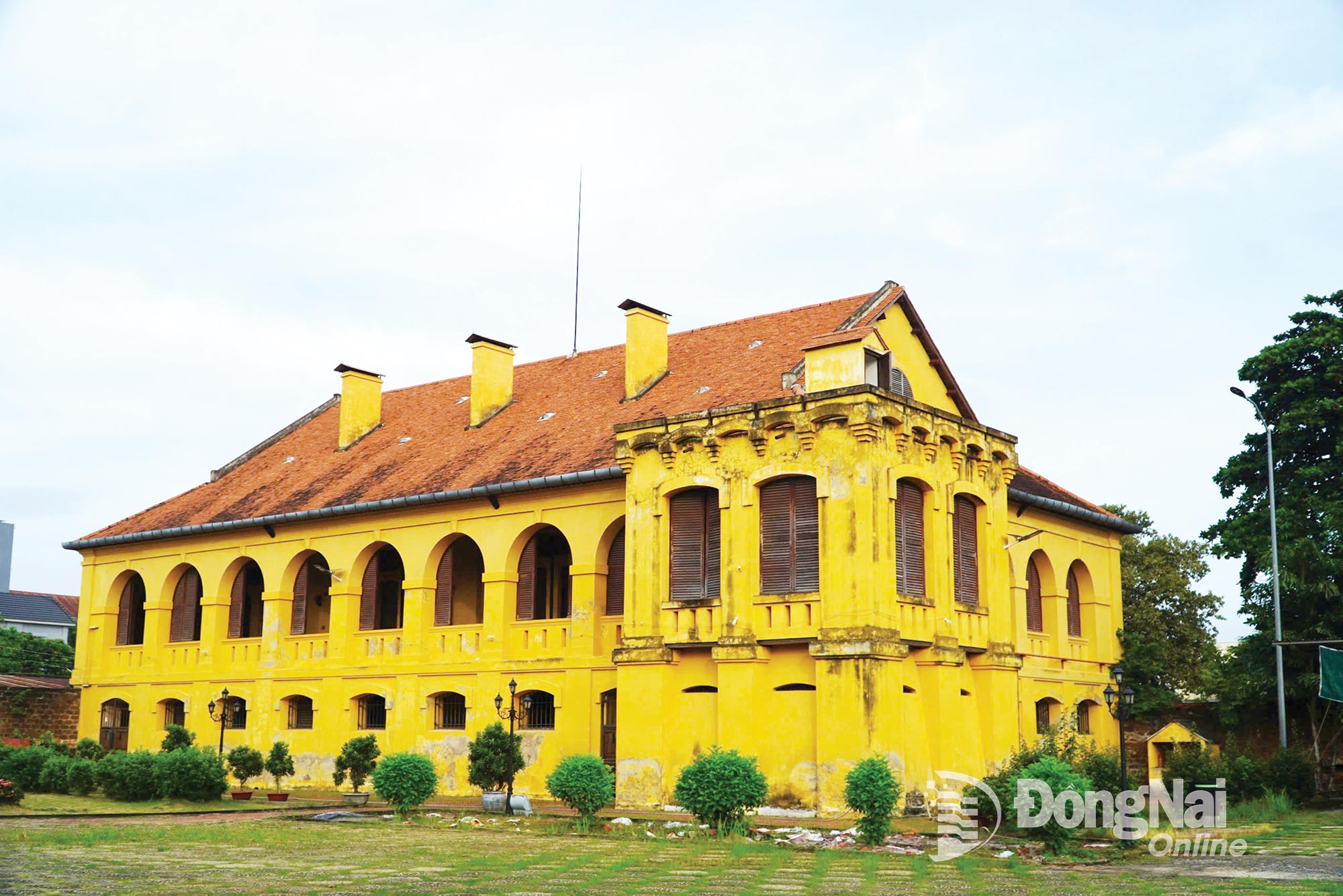 An ancient villa with time-worn tiled roofs – a well-preserved corner of French colonial architecture inside Bien Hoa Citadel.