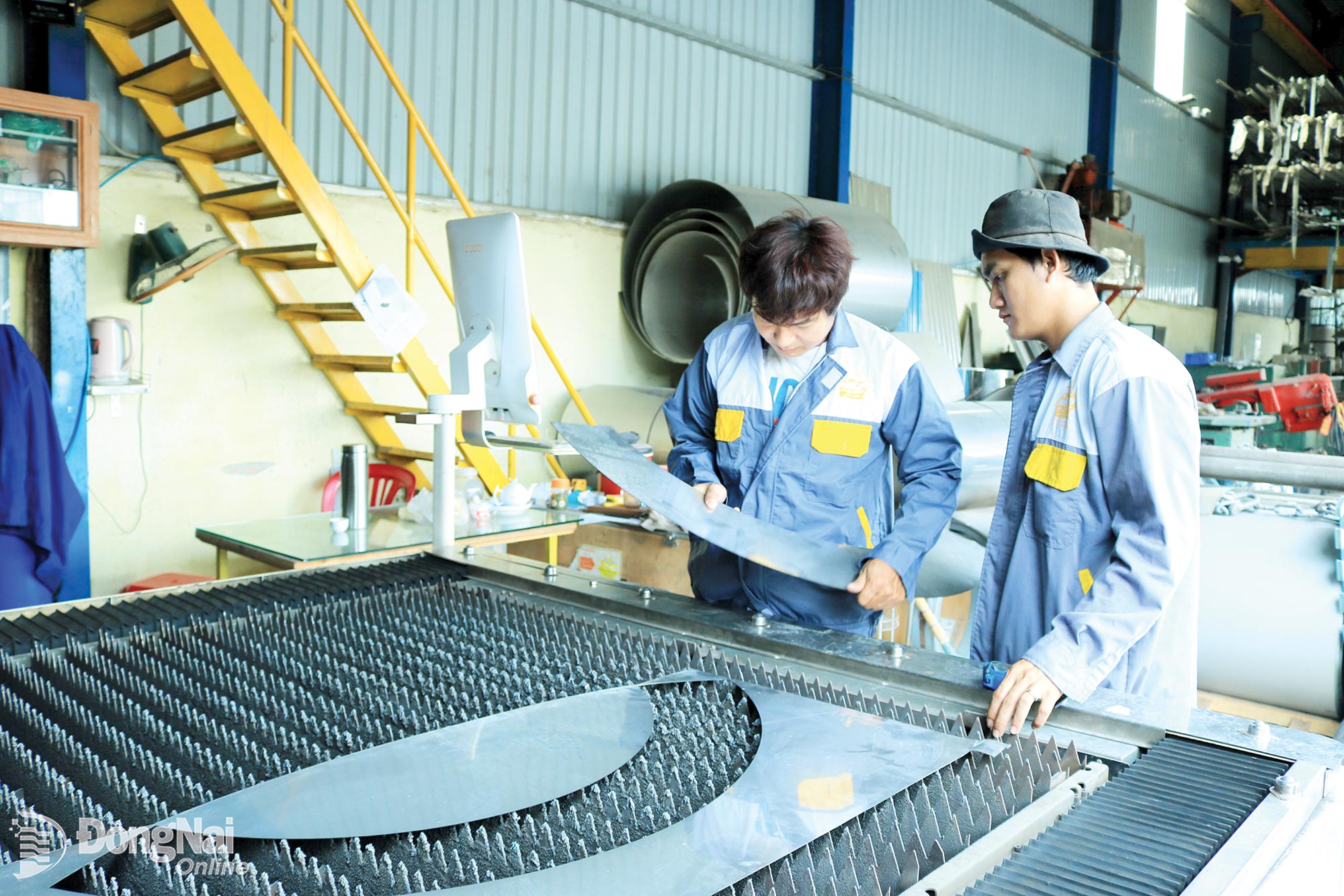 Workers at a private mechanical engineering company in Dong Nai.