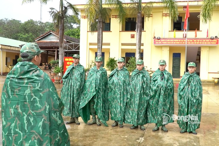 Soldiers of Bu Gia Map Border Guard Station listen to the mission deployment before setting out on border patrol