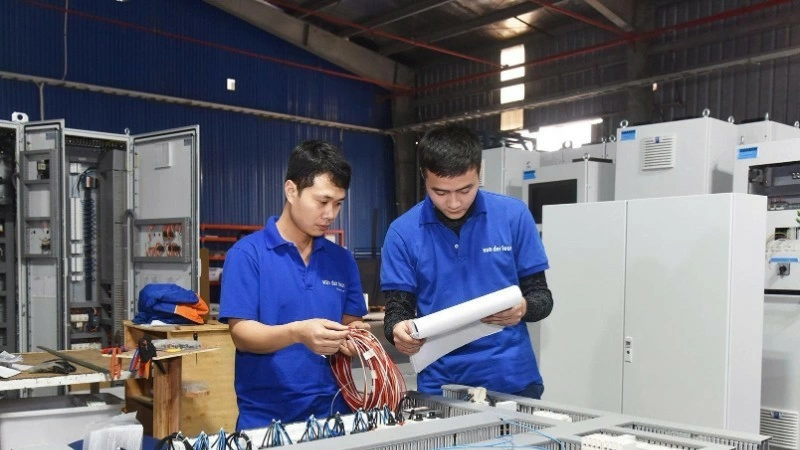 Workers of Van Der Leun Viet Nam checks and installs ship electronic boards. (Photo: Khanh An)