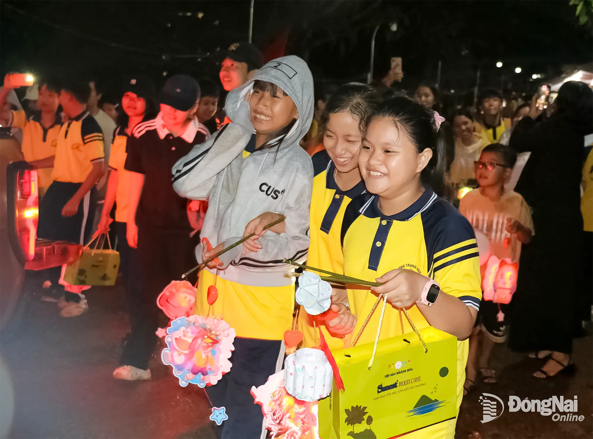Children excitedly take part in a lantern parade. Photo: Ngoc Huyen

