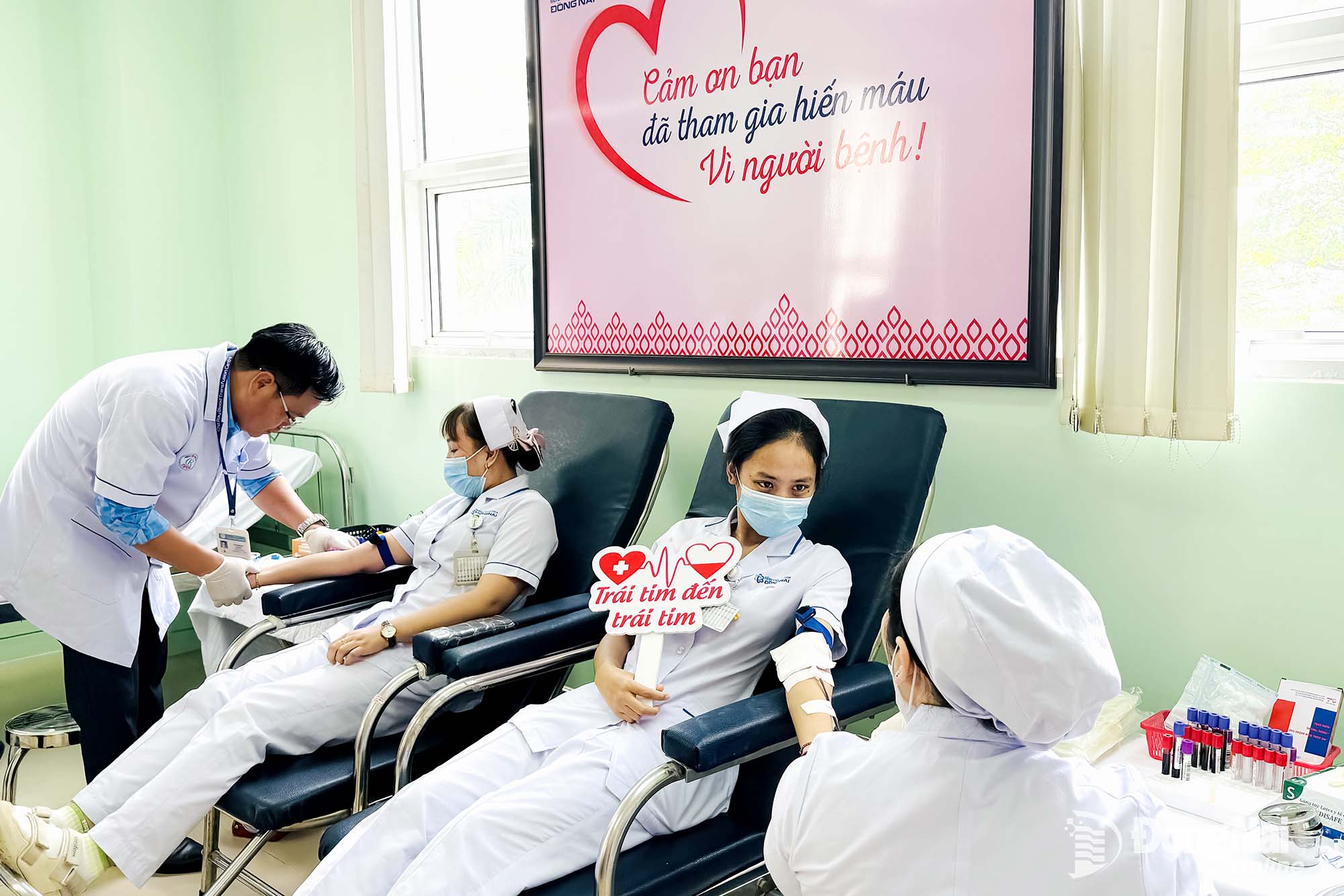 Medical staff at Dong Nai General Hospital participate in a voluntary blood donation drive.

