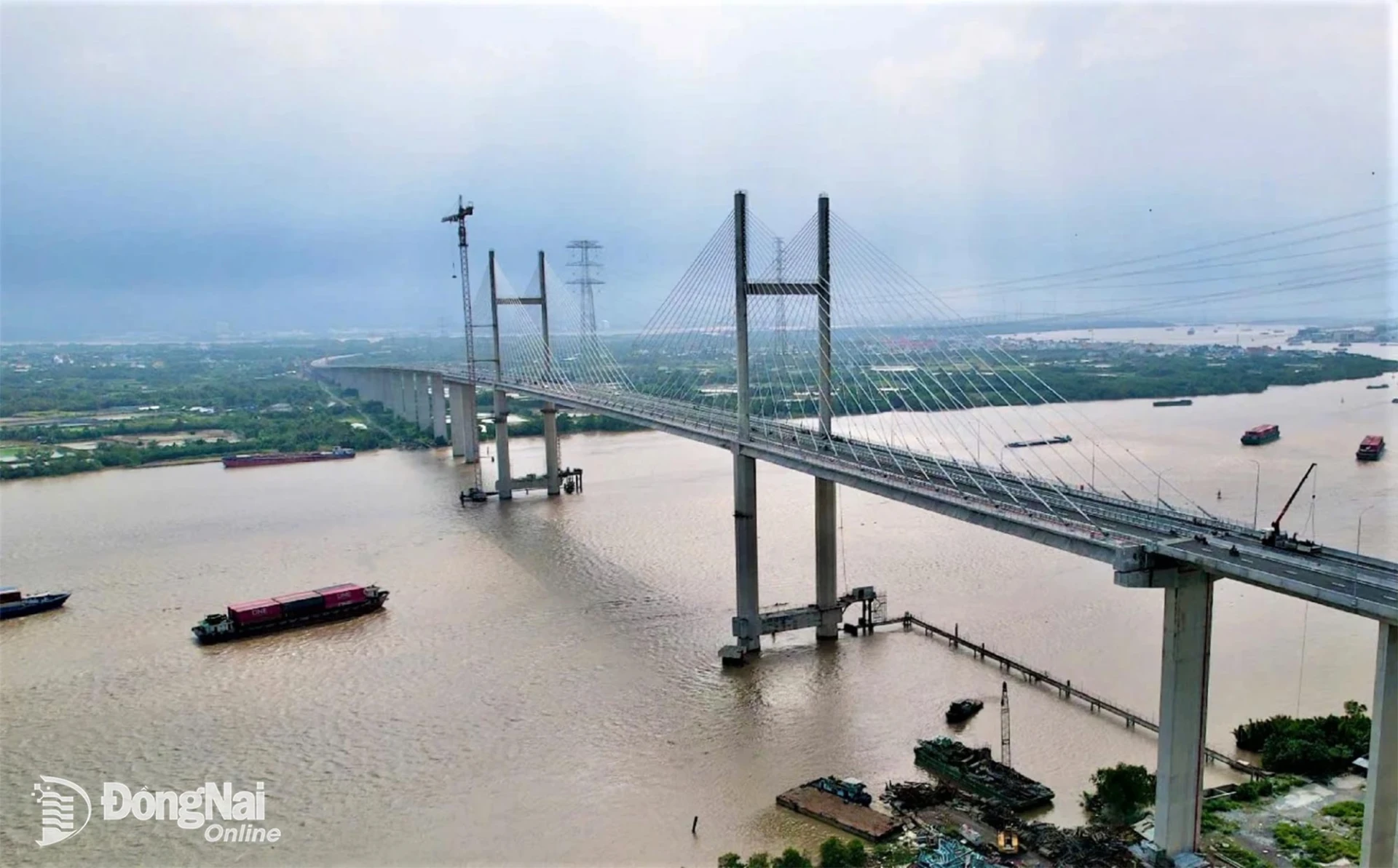 Phuoc Khanh Bridge spans the Long Tau River, connecting Can Gio in Ho Chi Minh City with Nhon Trach in Dong Nai City. The bridge is more than 3km long and has four traffic lanes and two emergency lanes. The main bridge features a cable-stayed structure, with a 300m main span and two towers standing about 155m high. Its vertical navigation clearance is 55m, among the highest in Viet Nam, allowing vessels of more than 30,000 tonnes to travel along the Long Tau River. Photo: Pham Tung

