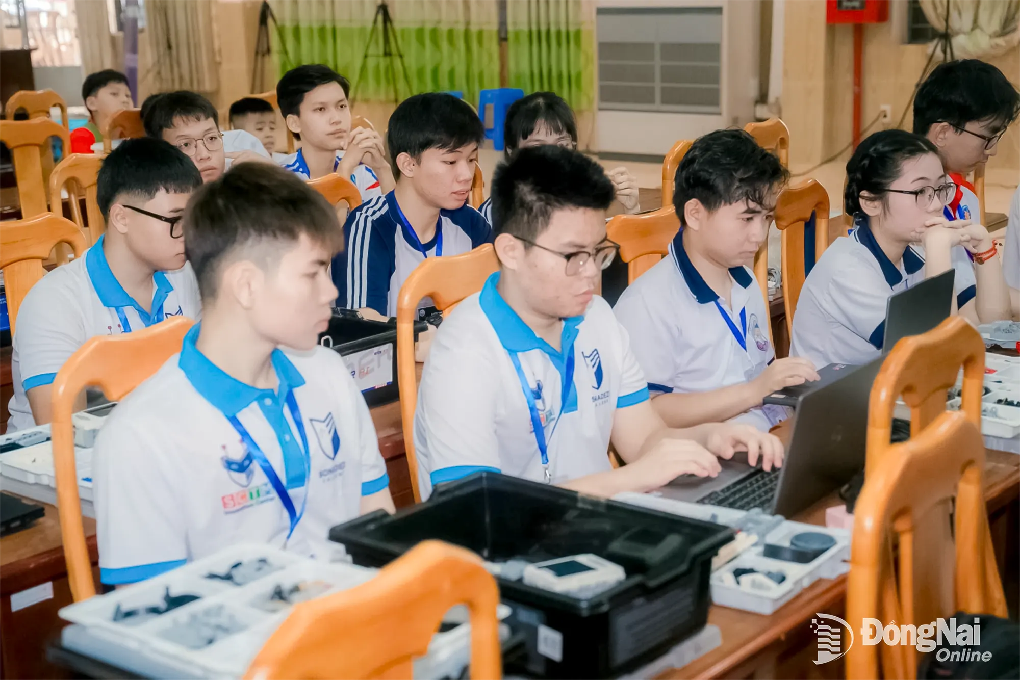 Teams program their robots directly at the competition venue.