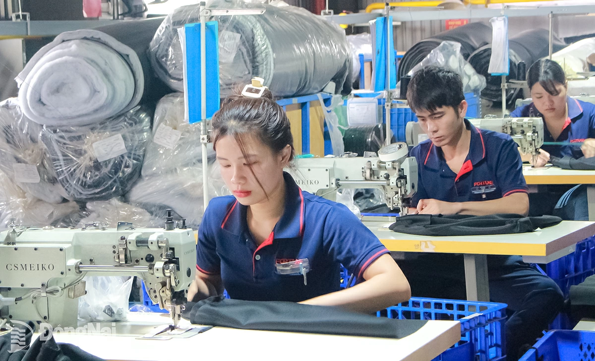 Stable labor relations contribute to promoting efficient and productive business operations. In the photo: Workers at Vietnam Fortune Technology International Co., Ltd. (Binh Phuoc Ward, Dong Nai Province) are in year-end production race. Photo: N.Hoa