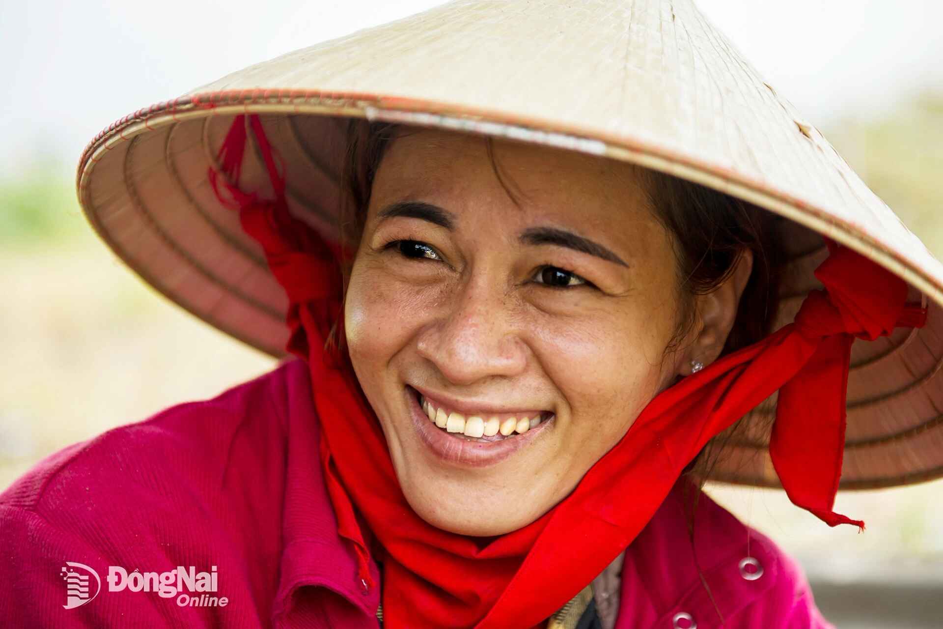 Smile of a Cham woman. Photo: Pham Ngoc Hien