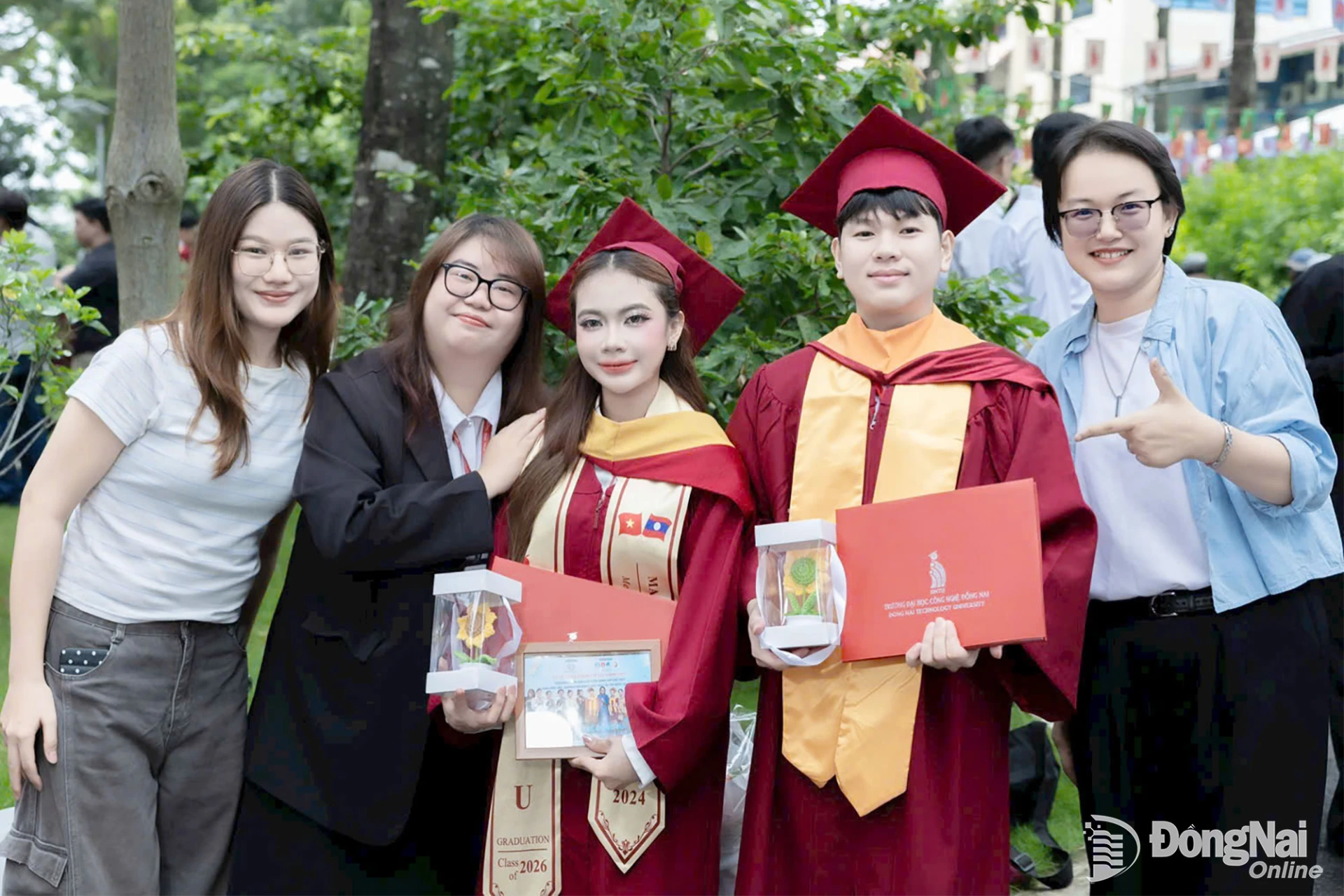 Malichansy Chinny (center) at her graduation ceremony at Dong Nai Technology University.

