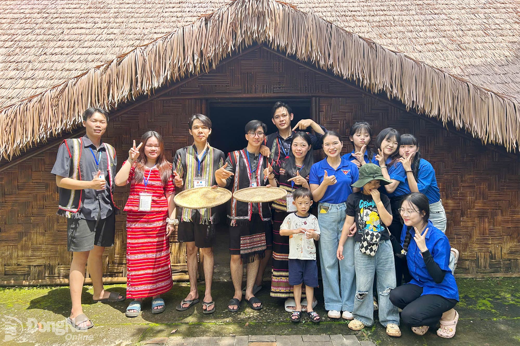 Visitors enjoy trying their hand at traditional rice pounding at the Bom Bo Hamlet National Historical Relic Site.

