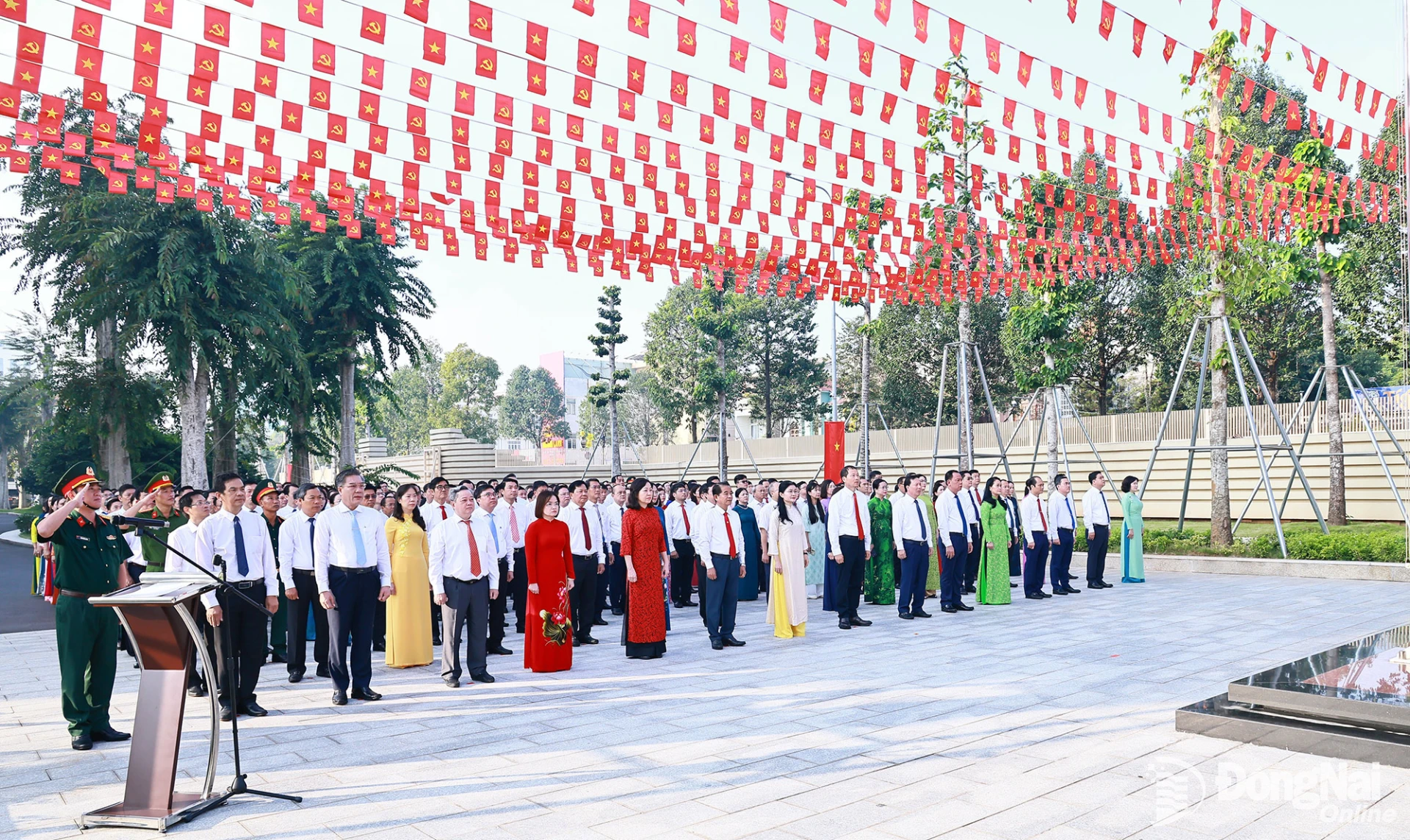 Officials attend the weekly flag-raising ceremony in front of the Ho Chi Minh Memorial House. Photo: Cong Nghia

