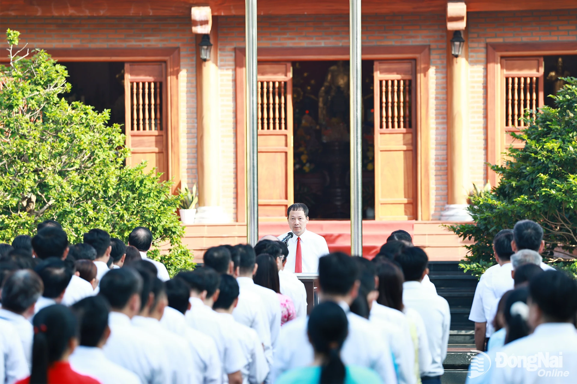 Vu Hong Van, Member of the PCC, Secretary of the CPC, speaks at the weekly flag-raising ceremony. Photo: Cong Nghia

