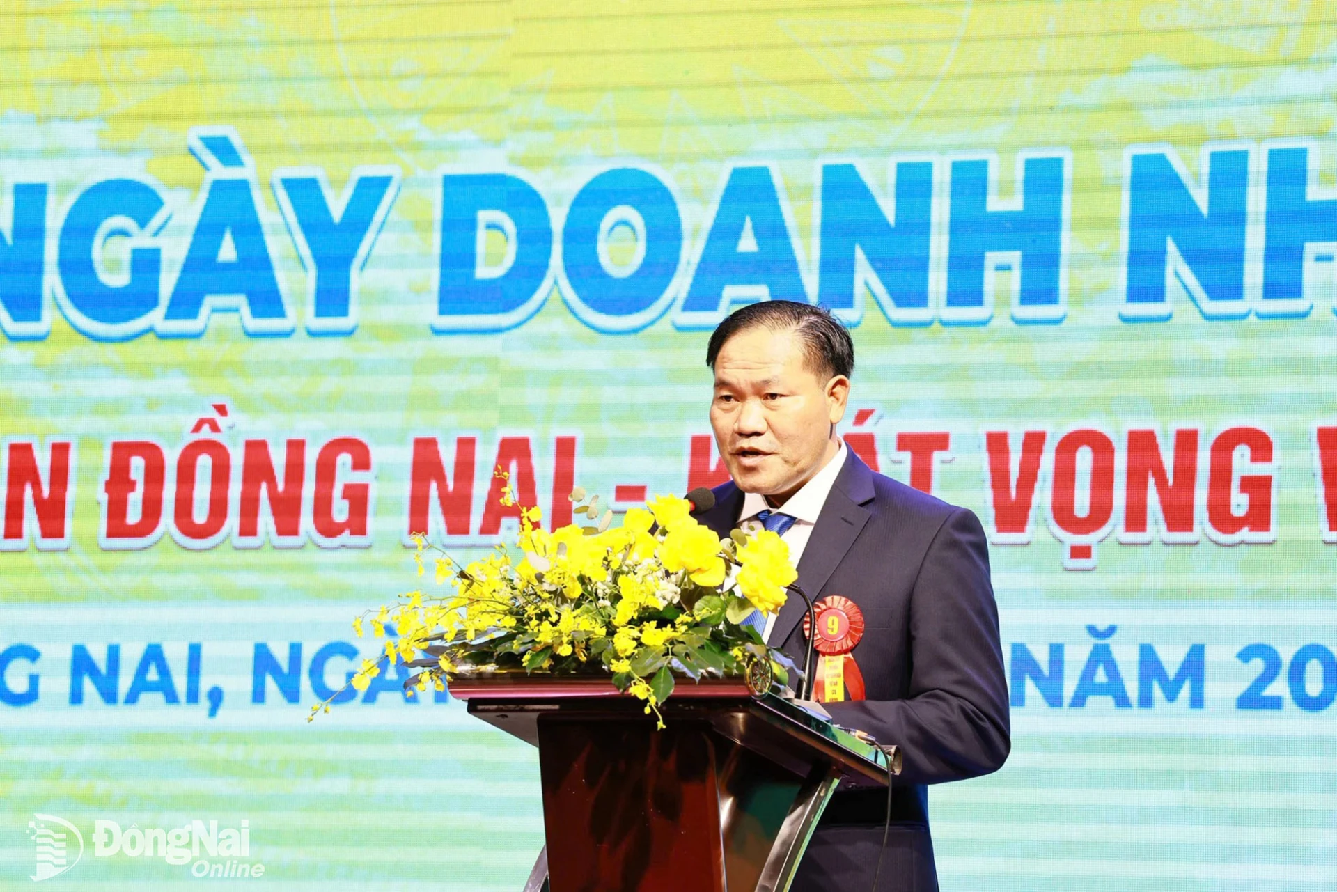 Dang Van Diem, Chairman of the DNBF, speaks about the business community’s efforts and determination. Photo: Cong Nghia

