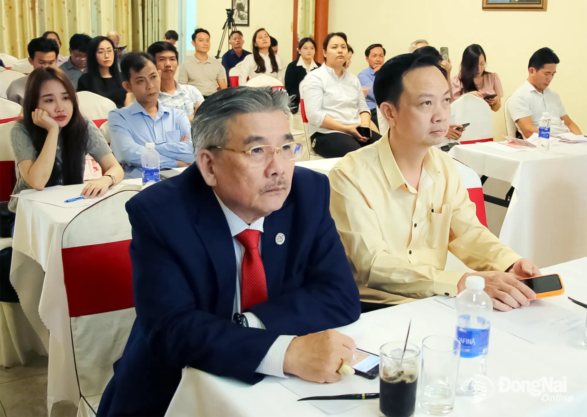 Experts and business representatives attend the seminar. Photo: Hai Quan

