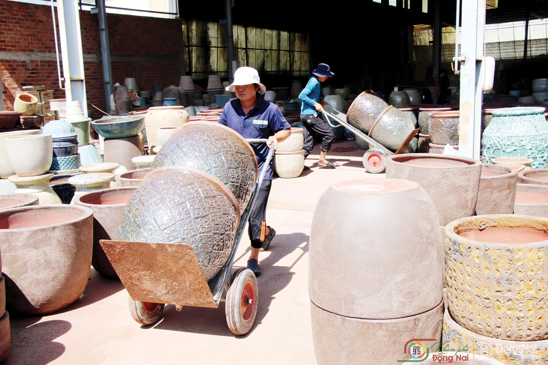 Fired at temperatures exceeding 1,000 degrees Celsius, the pottery is moved to a collection area before being packed for domestic and export markets.


