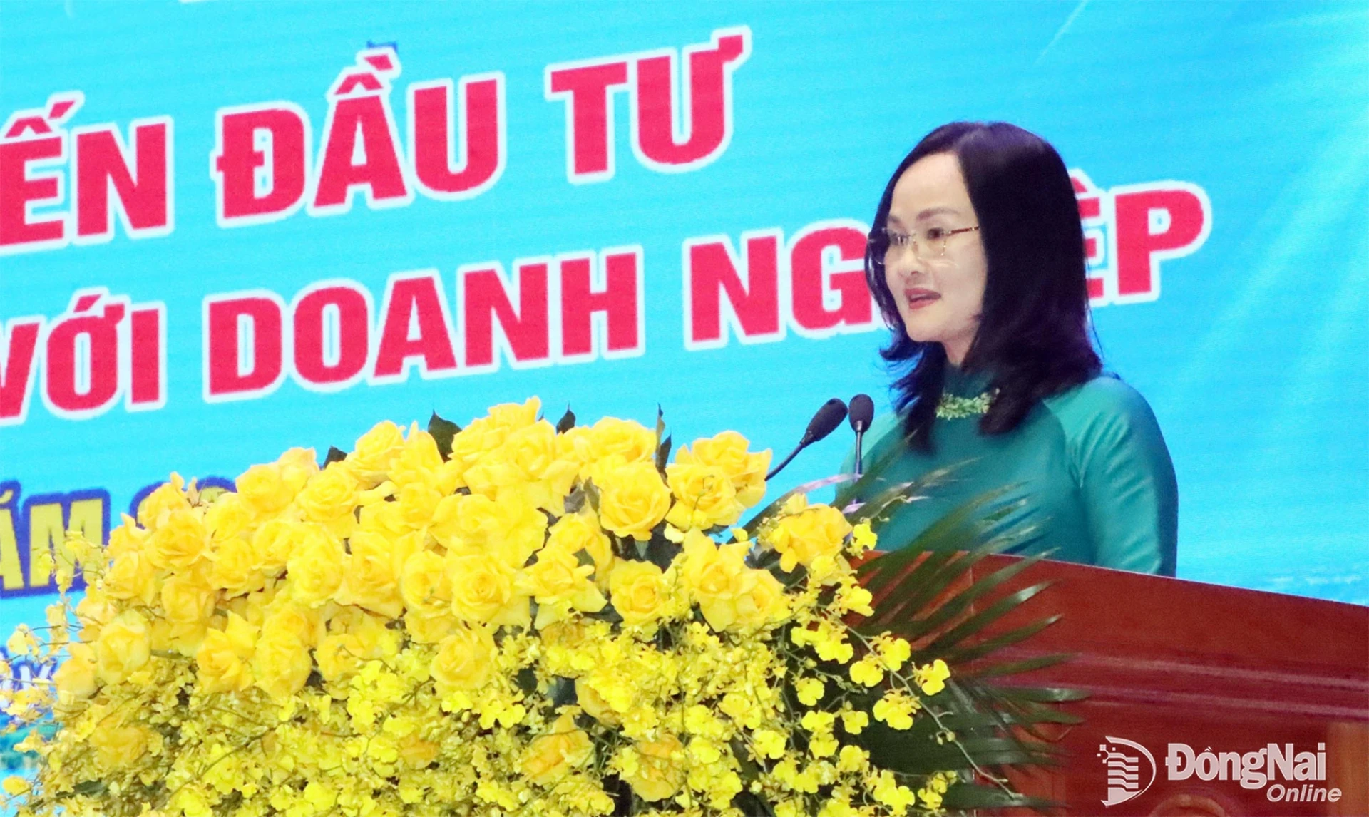Giang Thi Phuong Hanh, Member of the Dong Nai City Party Committee’s Standing Committee, Secretary of the Binh Phuoc Ward Party Committee, and Chairwoman of the Ward Peoples Council, delivers remarks at the conference. Photo: Quang Minh

