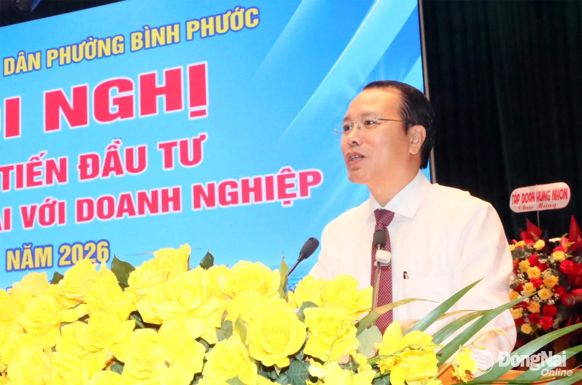 Ngo Hong Khang, Deputy Secretary of the Binh Phuoc Ward Party Committee and Chairman of the Ward Peoples Committee, addresses the conference. Photo: Quang Minh

