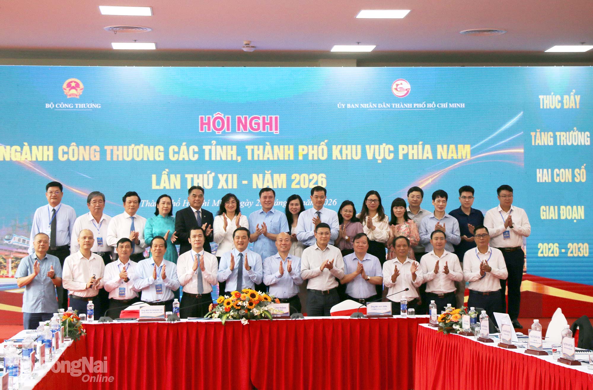 Delegates pose for a group photo after the conference. Photo: Hai Quan

