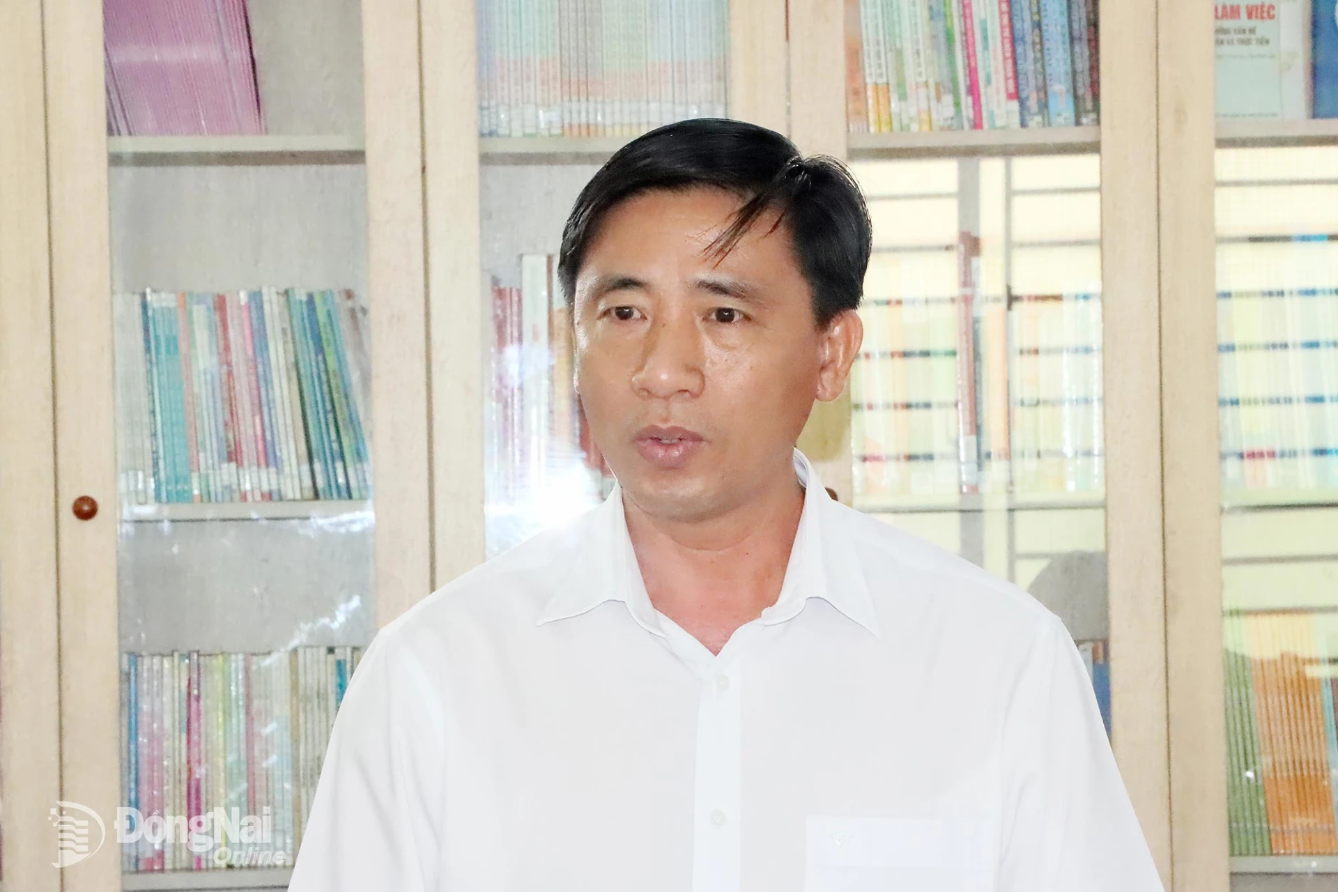 Bí thư Đảng ủy, Chủ tịch HĐND phường Lộc Ninh Nguyễn Gia Hòa, Ủy viên Ban Dân tộc HĐND thành phố phát biểu tại buổi giám sát. Ảnh: Quang Minh