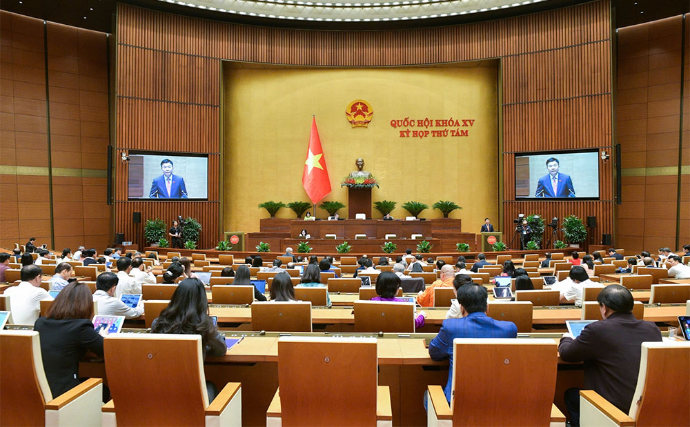 Quốc hội nghe Phó thủ tướng Chính phủ Lê Thành Long trình bày tờ trình về Dự án Luật Thuế thu nhập doanh nghiệp (sửa đổi). Ảnh: Quốc hội Media