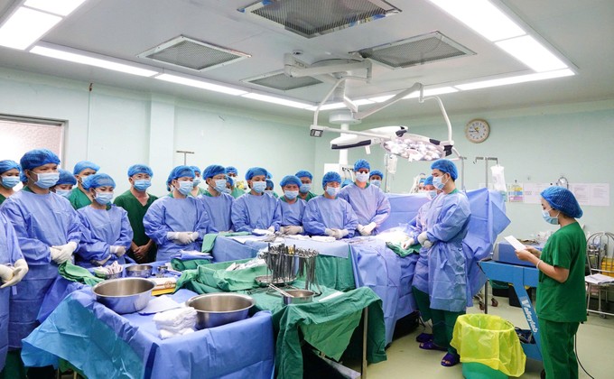 The medical team observes a moment of silence to honor the donor before beginning the surgery.