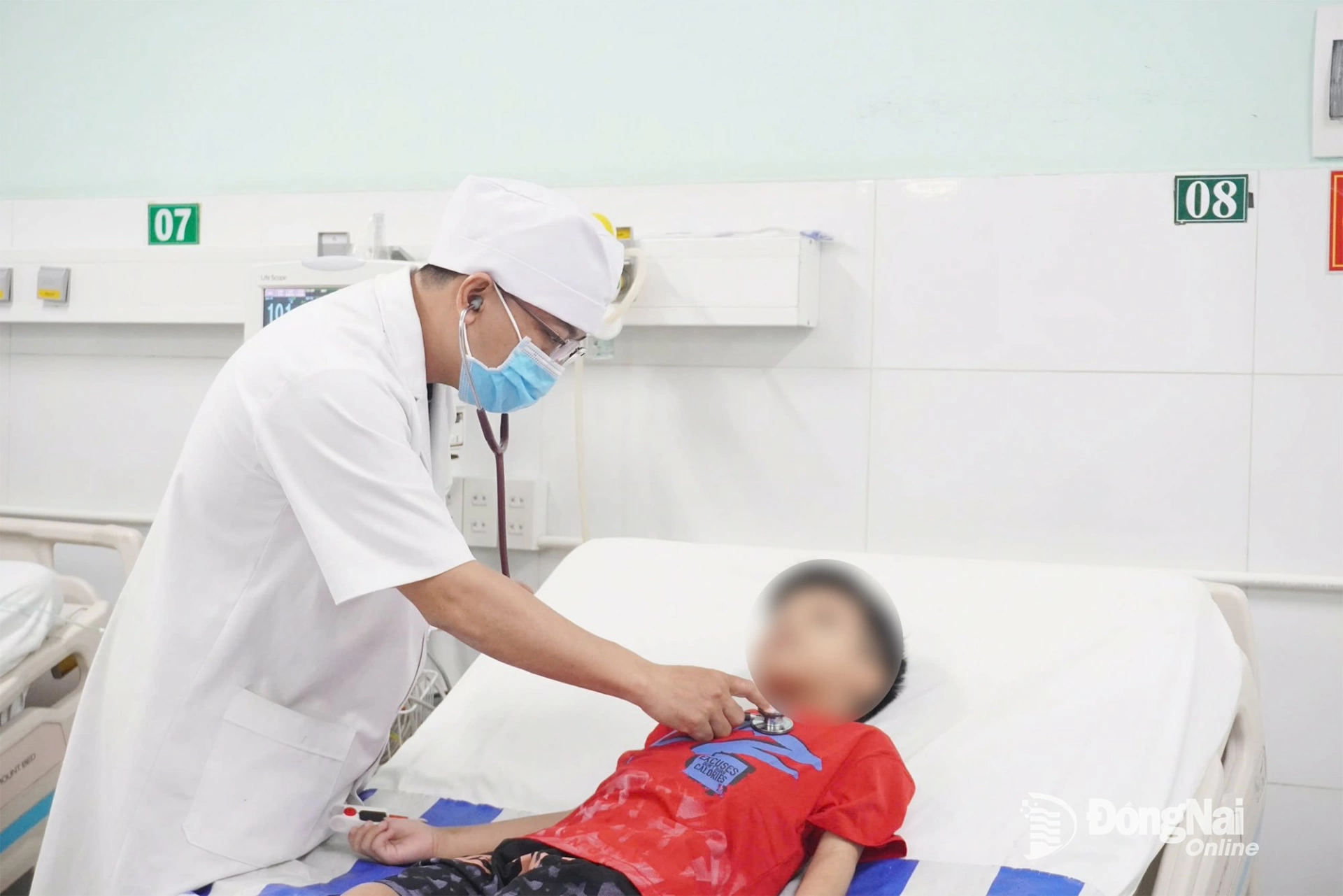 Doctors at Dong Nai Childrens Hospital check the health of a baby boy on November 20.