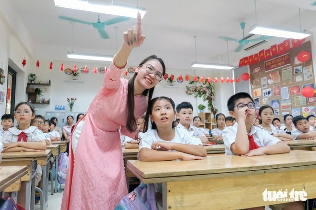 Students sit in a classroom in Hanoi, Vietnam, September 5, 2025