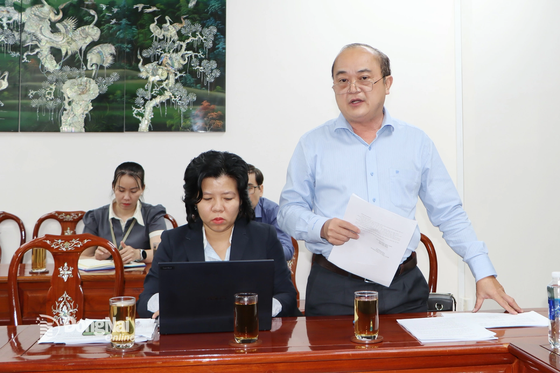 Vo Hoang Khai, Deputy Director of the Department of Science and Technology (standing member of the council), presents the results of 2025 activities. Photo: Vuong The