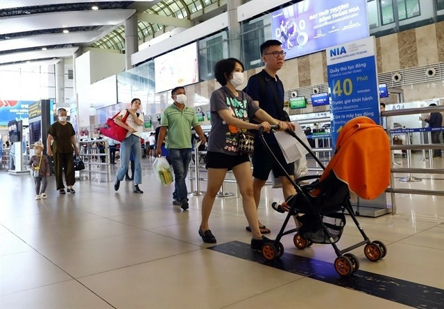 Passengers at Noi Bai International Airport. (Photo: VNA)