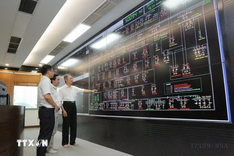 Managing and operating the power grid using information technology at the Ho Chi Minh City power system centre. (Photo: VNA)