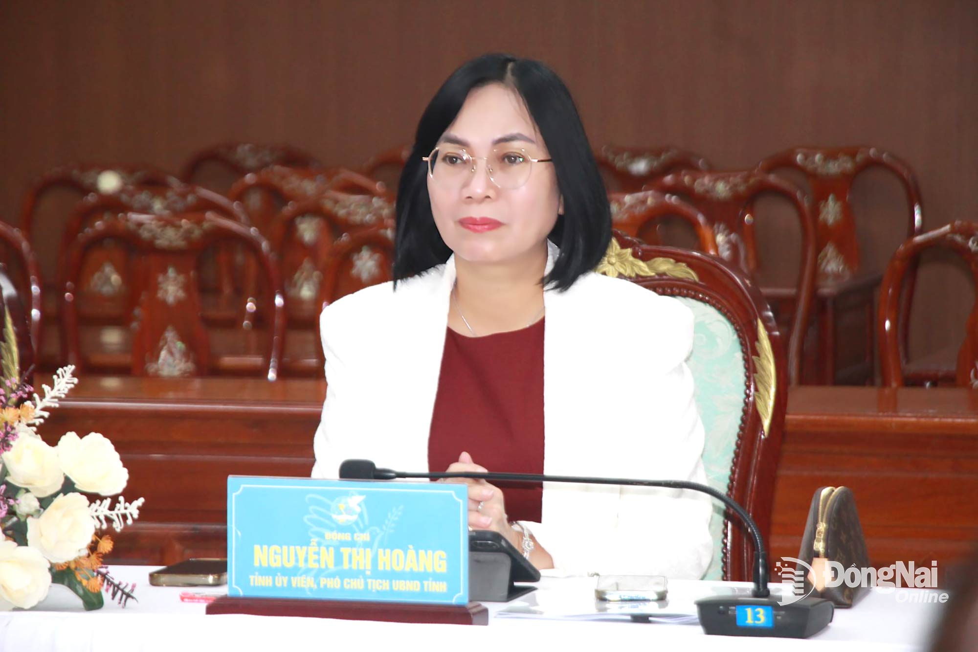 Provincial Party Committee member, Vice Chairwoman of the Dong Nai Provincial Peoples Committee Nguyen Thi Hoang attends the conference at Dong Nai venue. Photo: Nga Son

